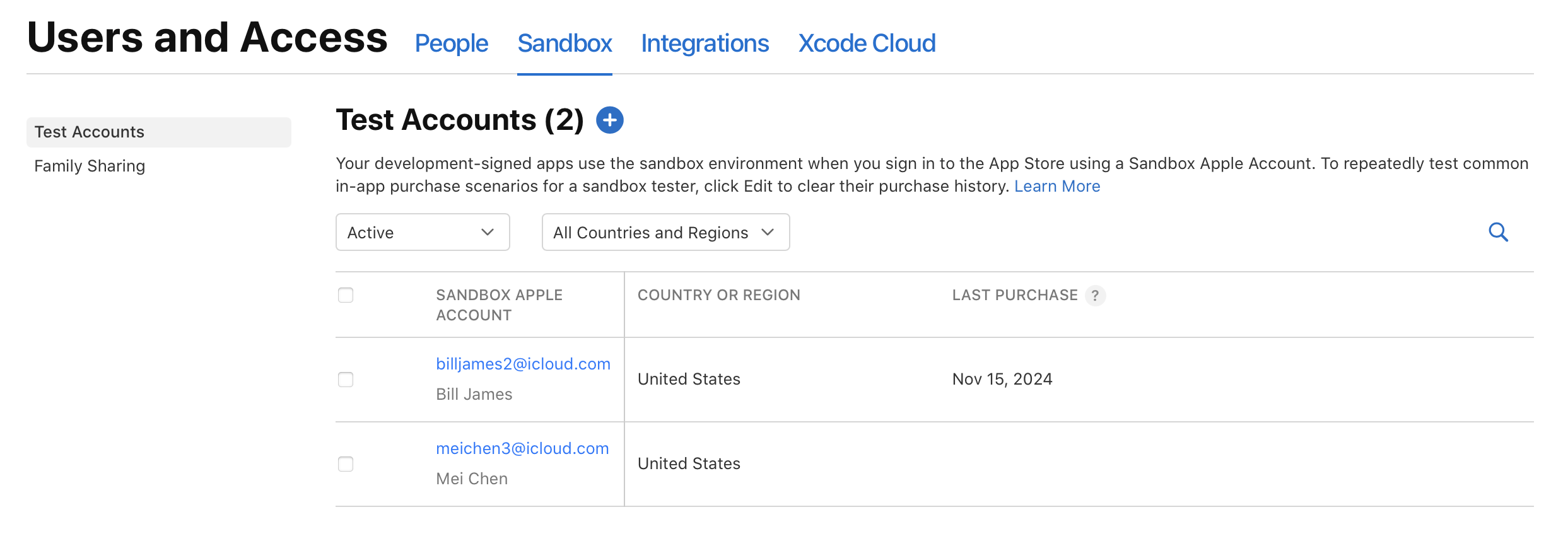 截屏为“测试账户”页面，显示已添加两个沙盒账户。添加按钮（加号键）位于“测试账户”标题右侧。